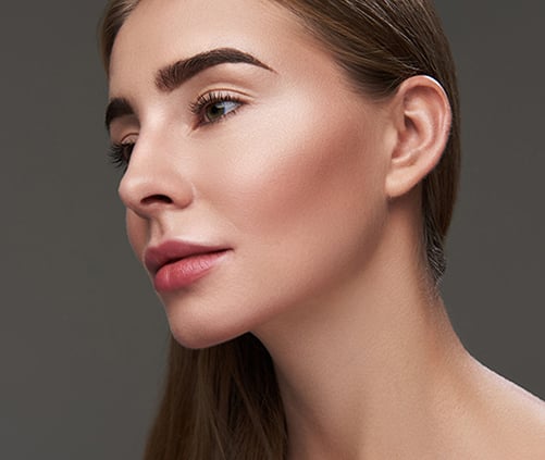 woman with pink cheeks